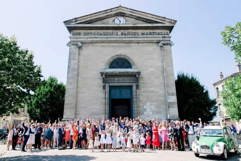 Group photo of the guests outside the Saint-Martial church in Bordeaux