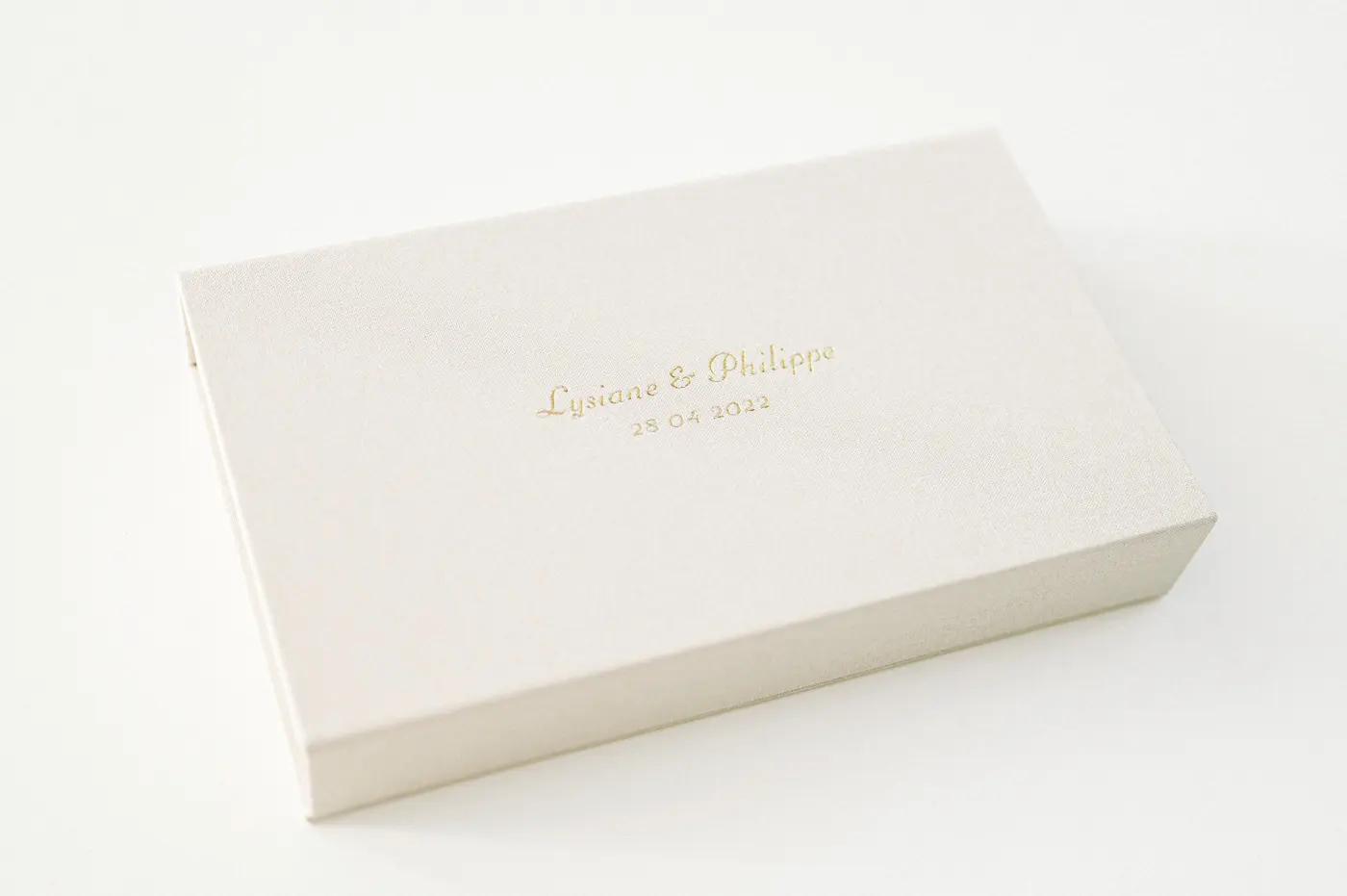 Ecru linen wedding photo box with names hot-stamped in gold