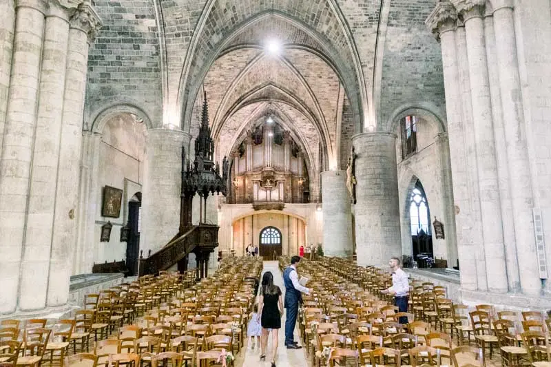 The nave of the Basilica of Saint-Seurin with its wooden chairs