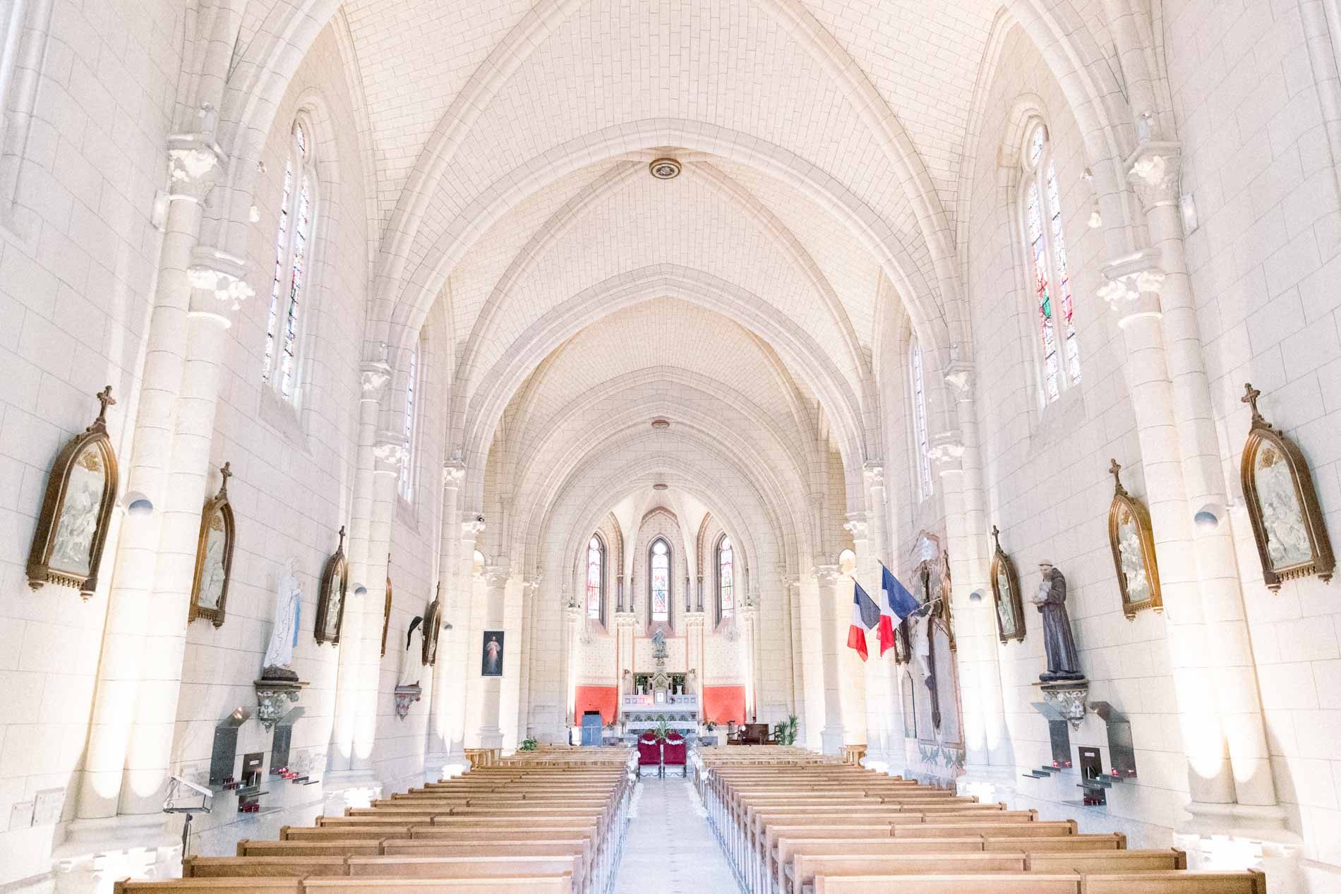 The bright nave of Saint-Martin church in Eysines before the ceremony