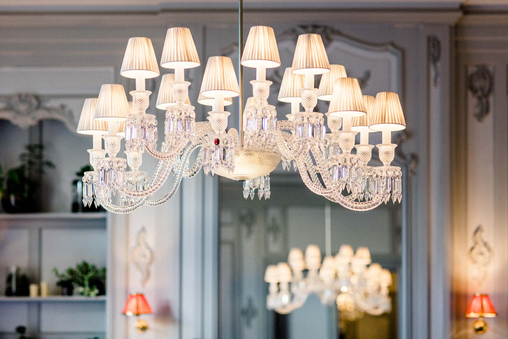 Crystal chandelier and panelling in a salon of La Grande Maison de Bernard Magrez