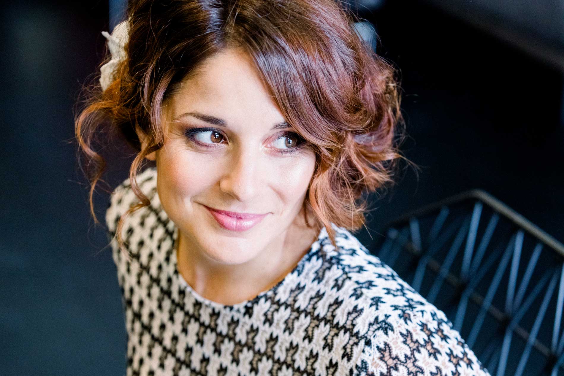 Portrait of the bride in a houndstooth dress before the civil ceremony
