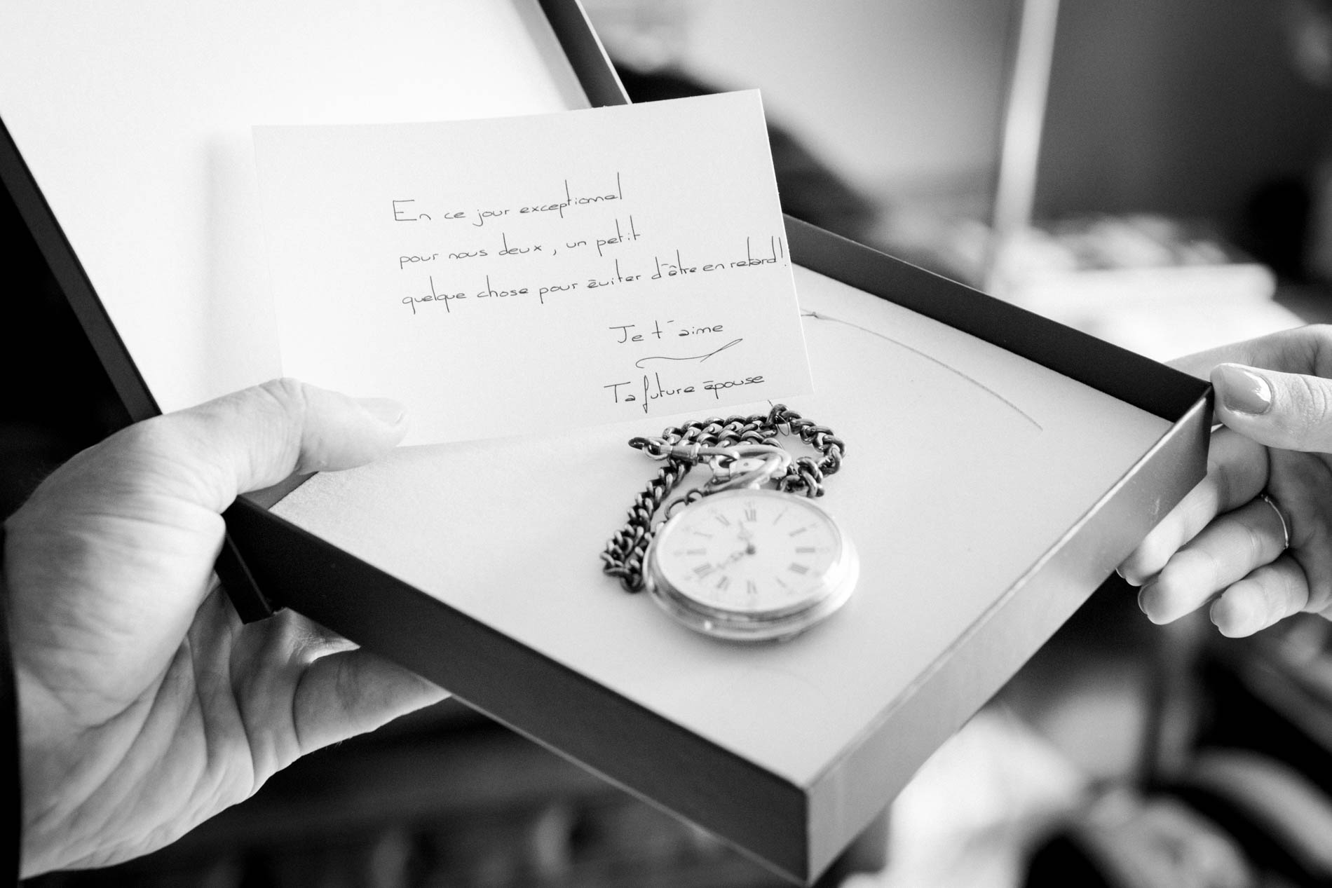 Pocket watch and handwritten letter in a gift box for the groom