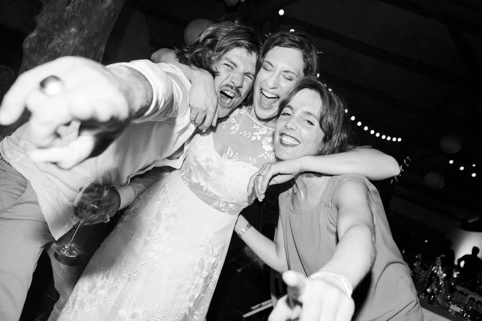 Bride and her friends goofing around for the camera at the party