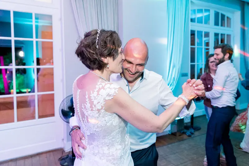 The newlyweds dance together as the evening party gets going