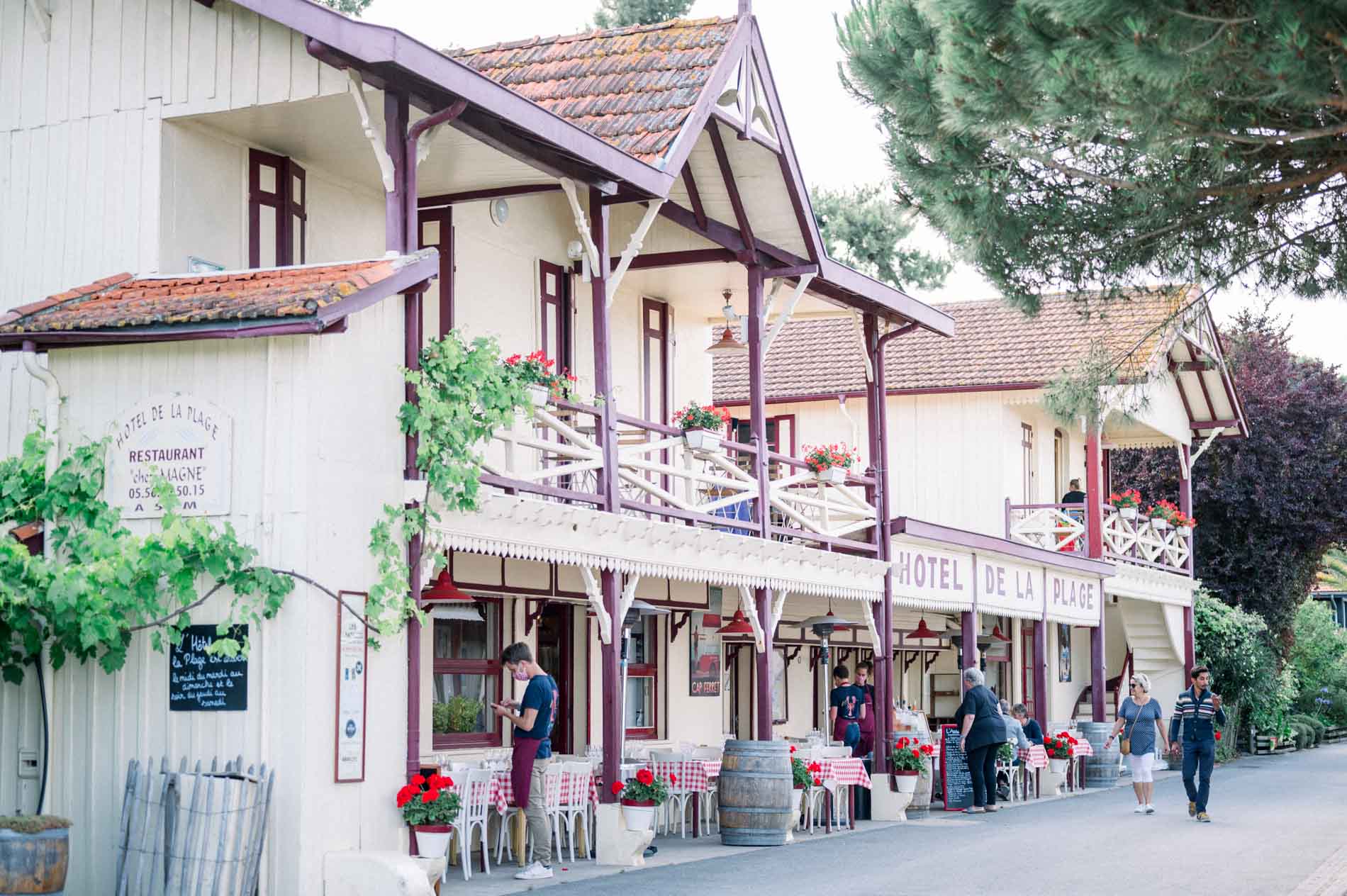 The Hôtel de la Plage with its wooden balconies in the heart of the village of L'Herbe