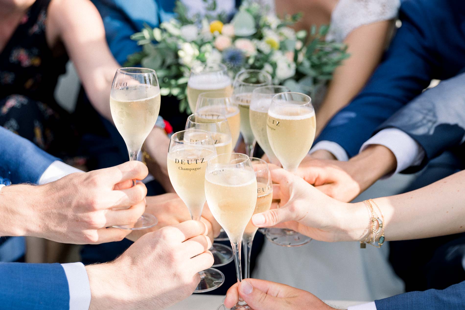 Champagne toast on board the boat on the Garonne