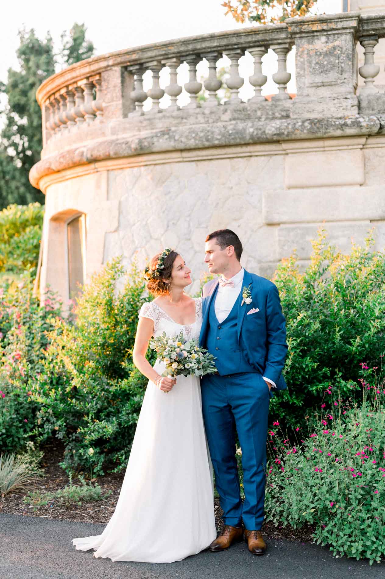 The couple in front of the balustraded tower of Château Grattequina