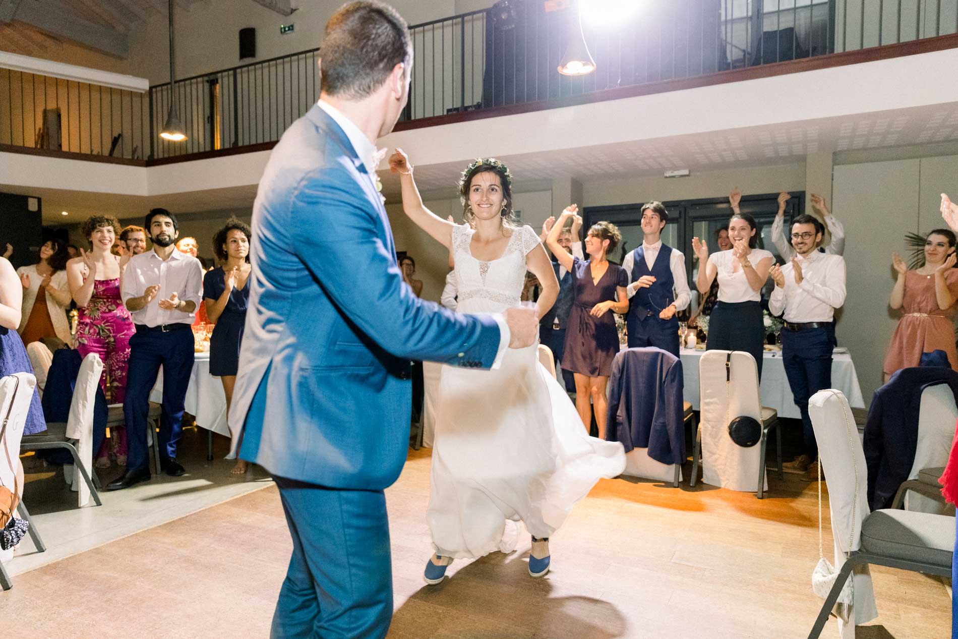 The couple's first dance in the reception hall of Château Grattequina