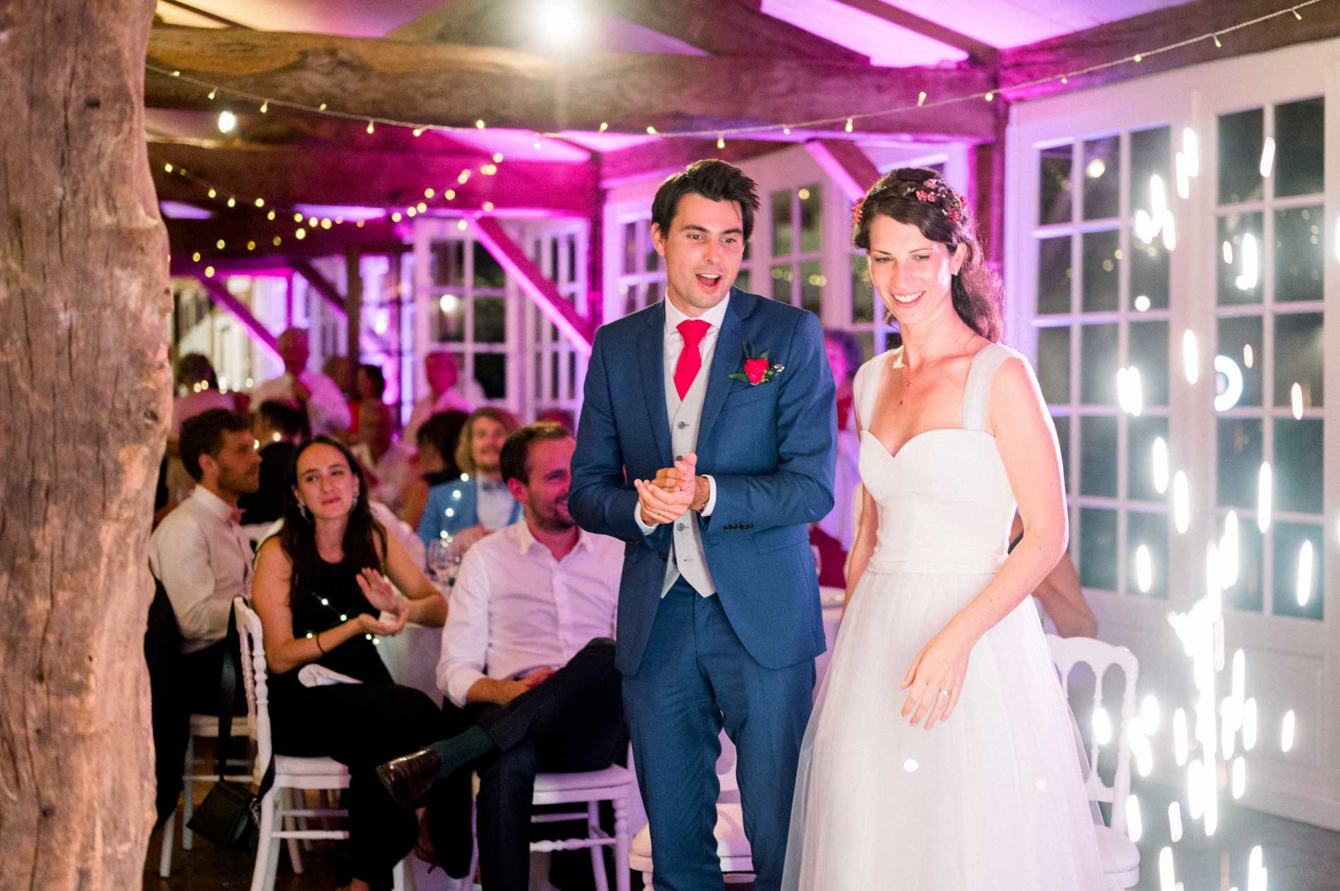 The newlyweds make their entrance into the reception hall to applause