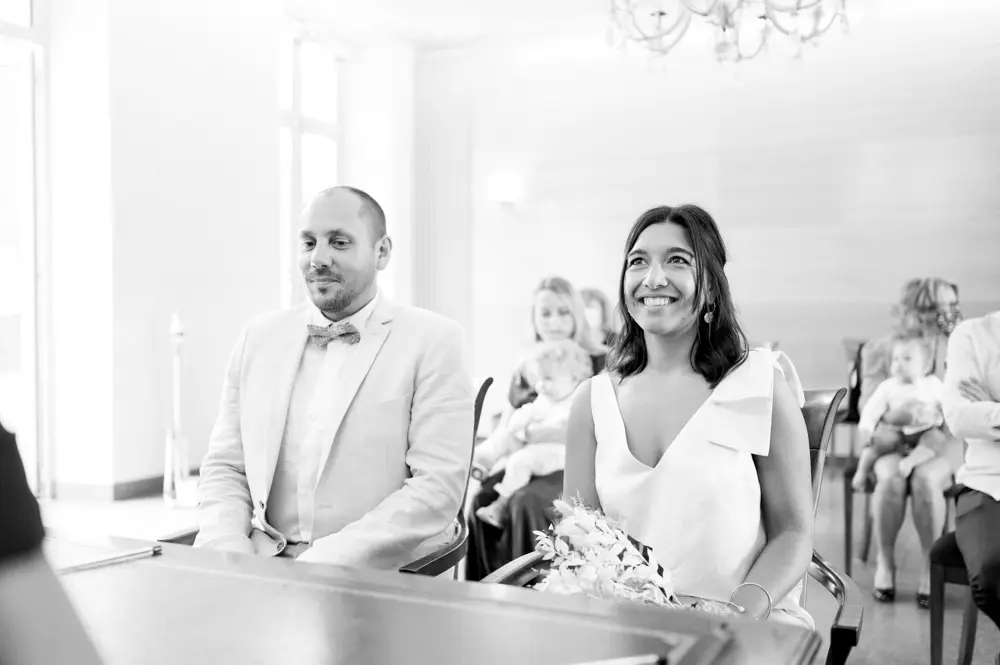 The couple during the civil ceremony at Château de Cazalet, in black and white