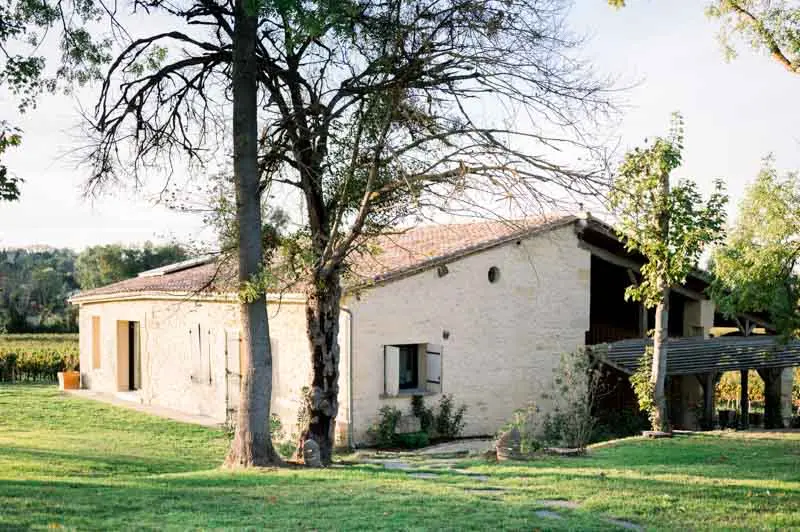 Stone guesthouse for wedding guests in the park of Château de Garde
