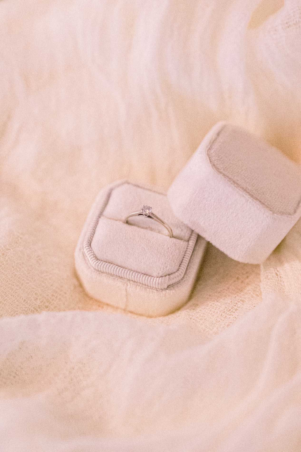 Engagement ring in a blush pink velvet box