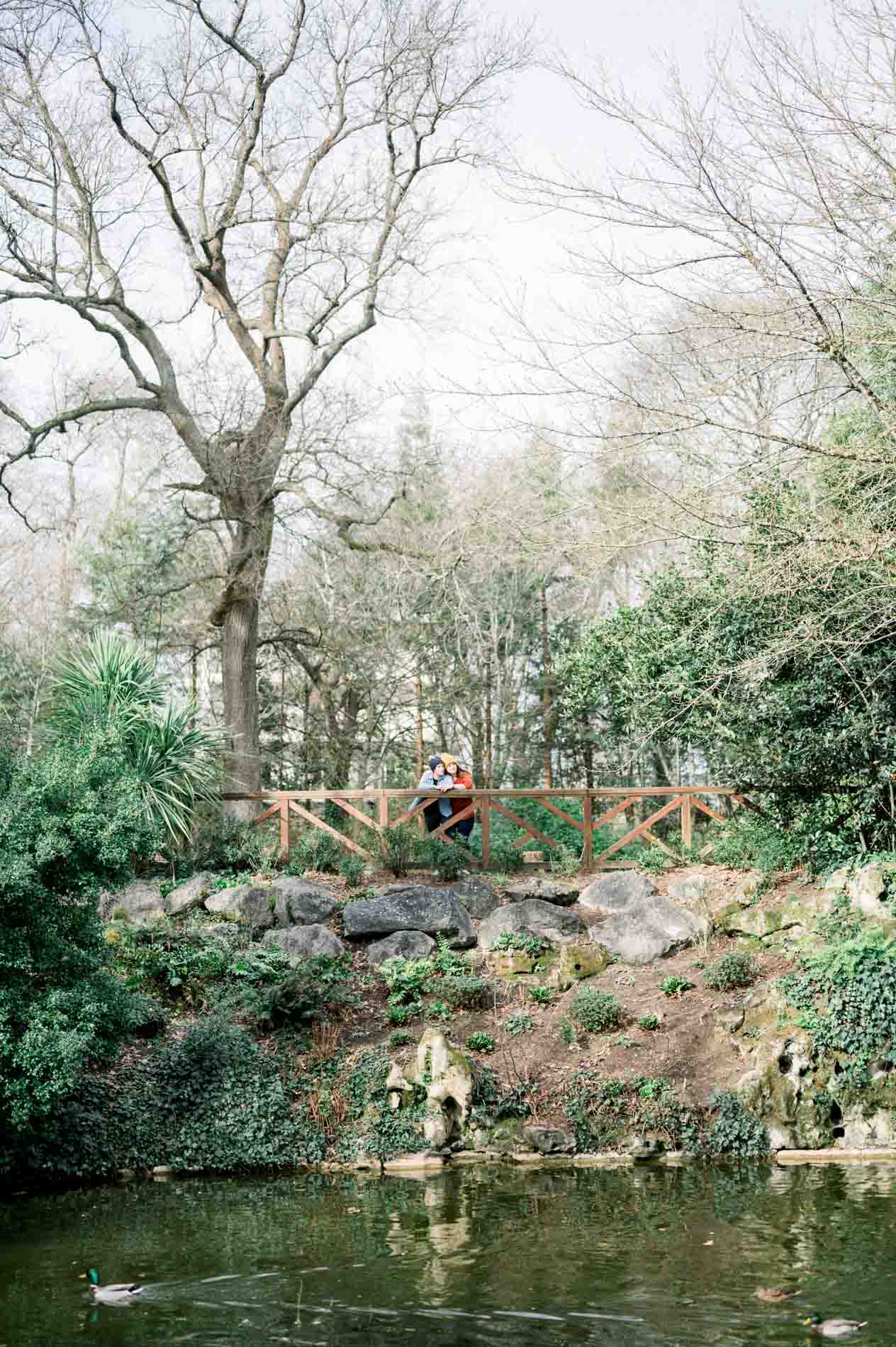 Pond, rockery and winter trees in the Parc Bordelais, Bordeaux