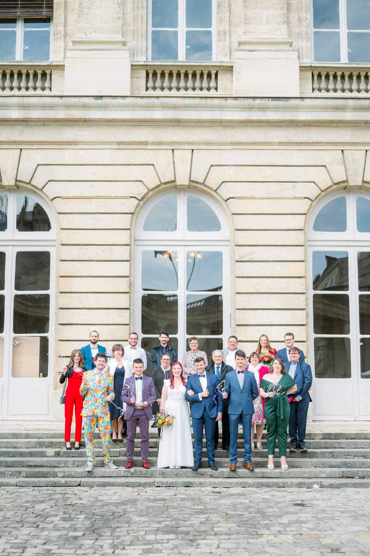 Group photo of the guests on the steps of Bordeaux city hall