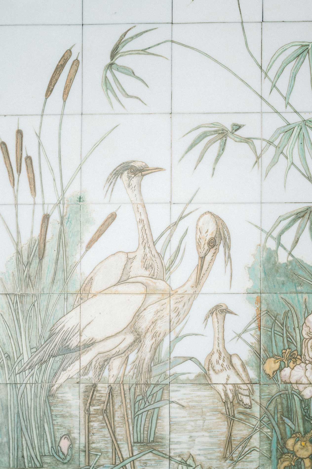 Painted ceramic tiles depicting herons and reeds
