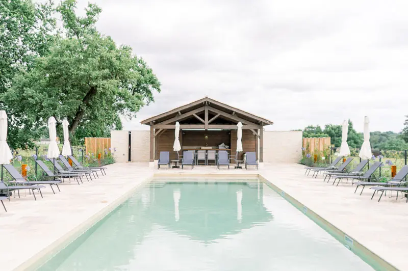Swimming pool and pool house at Château Gassies