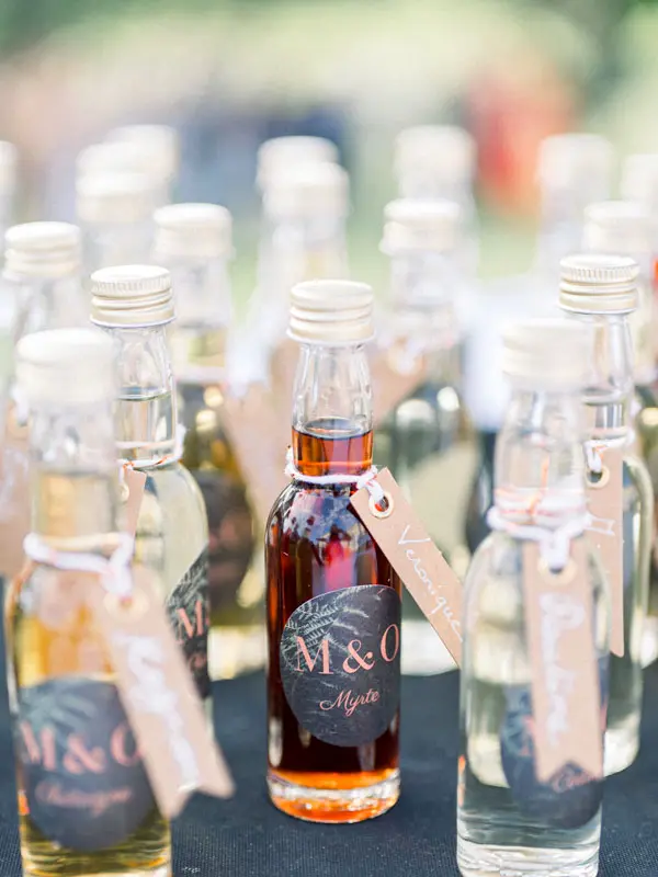 Personalised miniature bottles of flavoured rum as guest favours