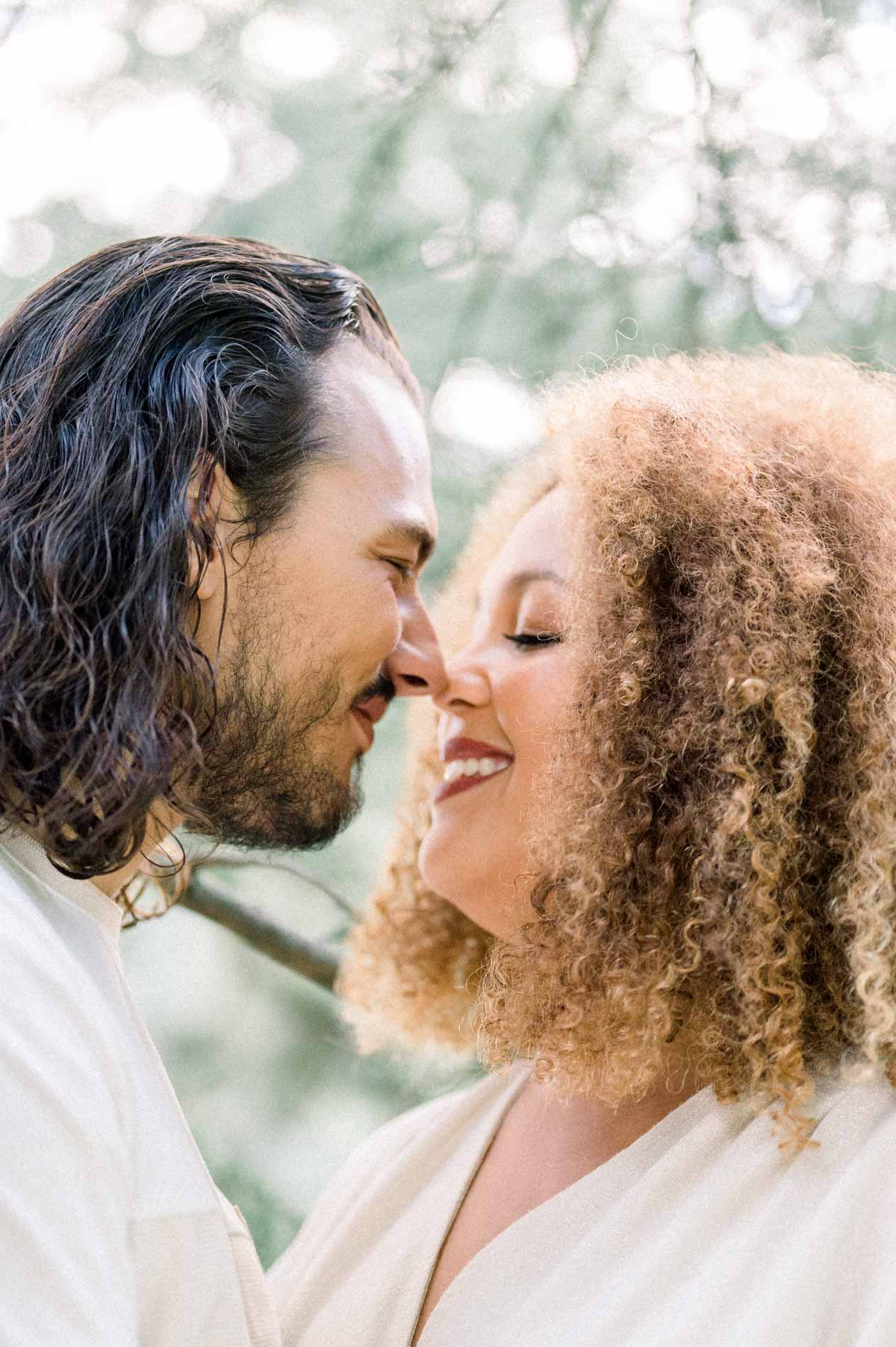 Close-up of the couple nose to nose with eyes closed