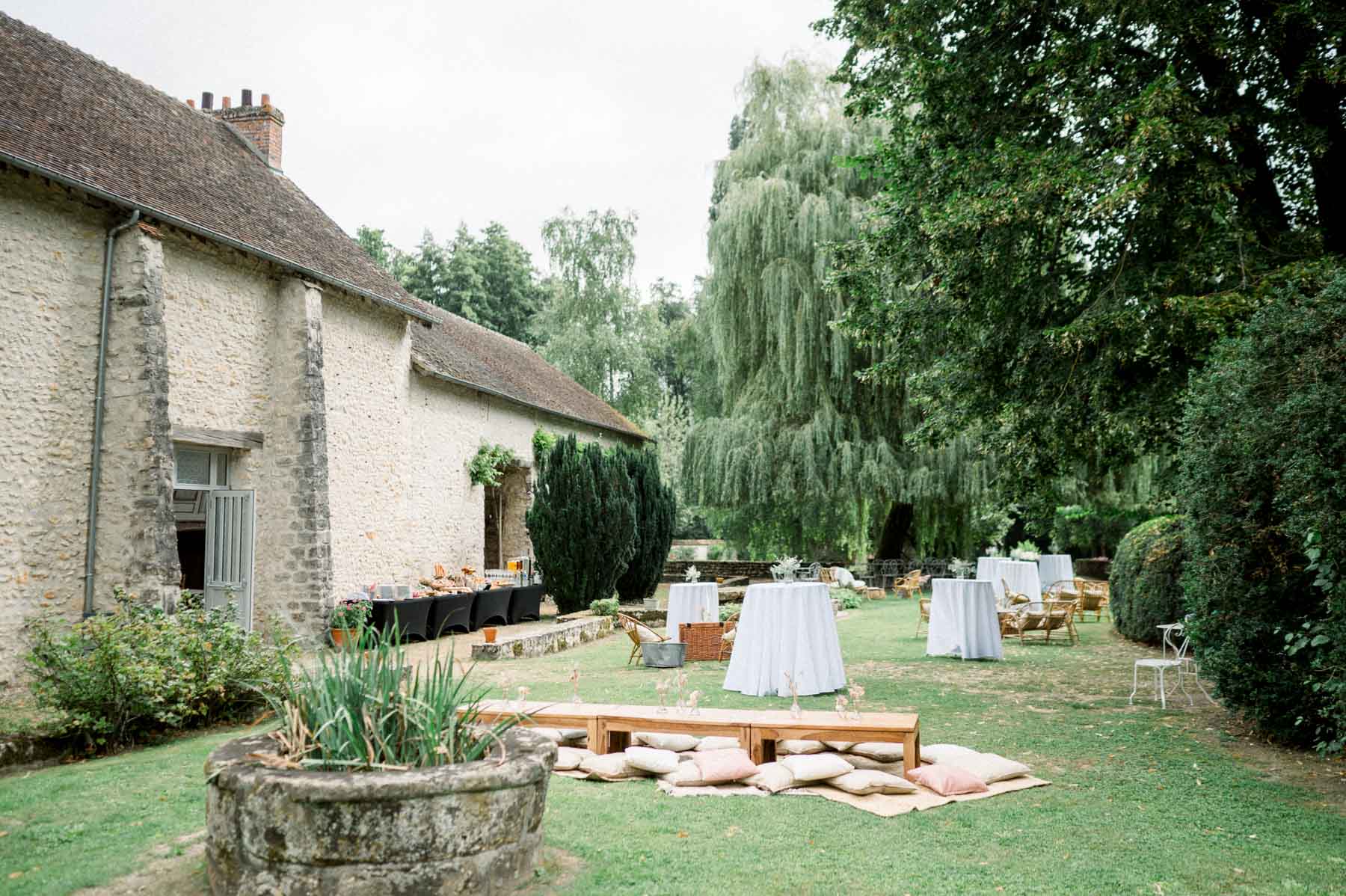 Cushions and low tables set out on the lawn for the next-day brunch