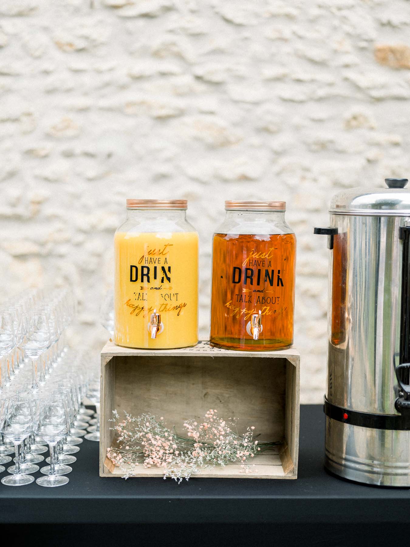 Drink dispensers and glasses on the next-day brunch buffet