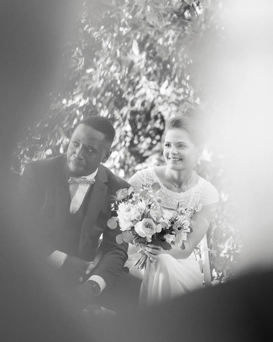 The couple moved during the outdoor ceremony, in black and white