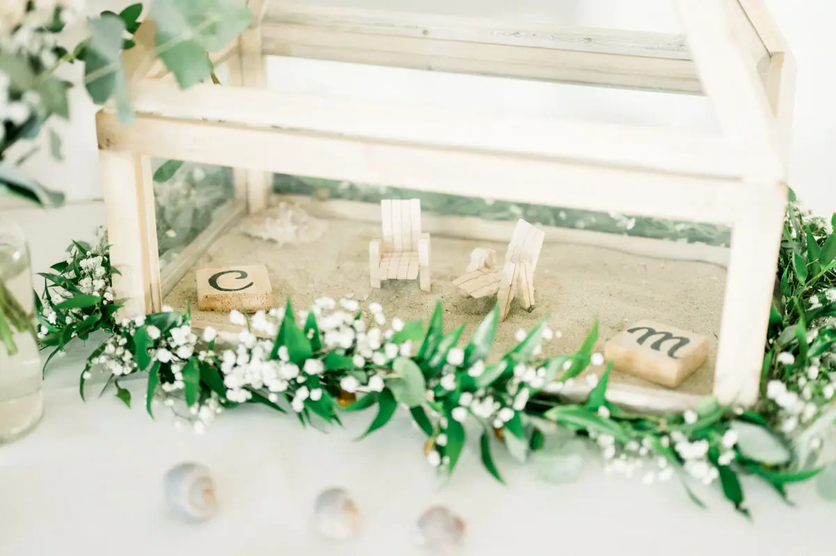 Wood and glass wedding card box decorated with baby's breath