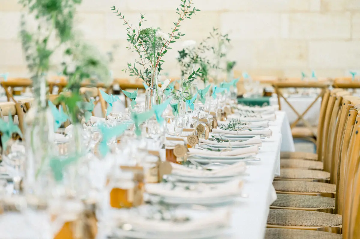 Long table set with glassware and greenery, styled by Scenography Joel AP