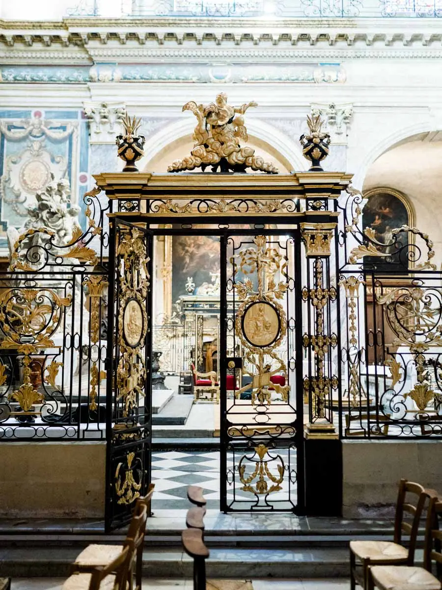Gilded wrought-iron gate of the choir at Notre-Dame church, Bordeaux