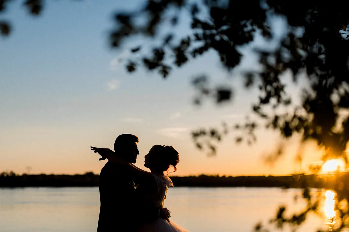 Couple silhouetted at sunset, Domaine de Conseillant wedding