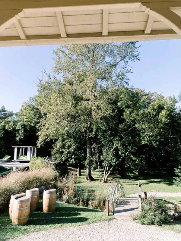 View of the villa's park and wine barrels from the veranda