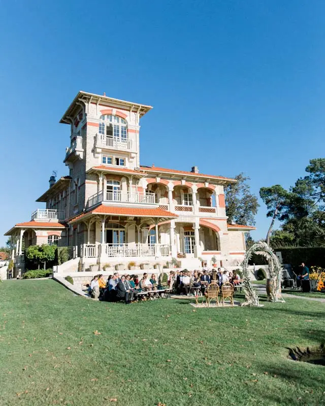 Guests gathered on the Villa La Tosca lawn during the outdoor ceremony