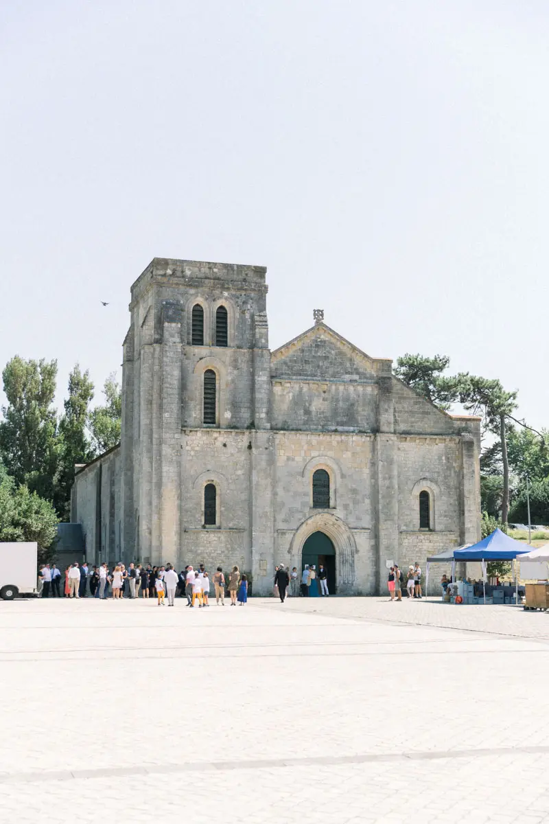 Guests gathered outside the Notre-Dame-de-la-fin-des-Terres basilica in Soulac-sur-Mer