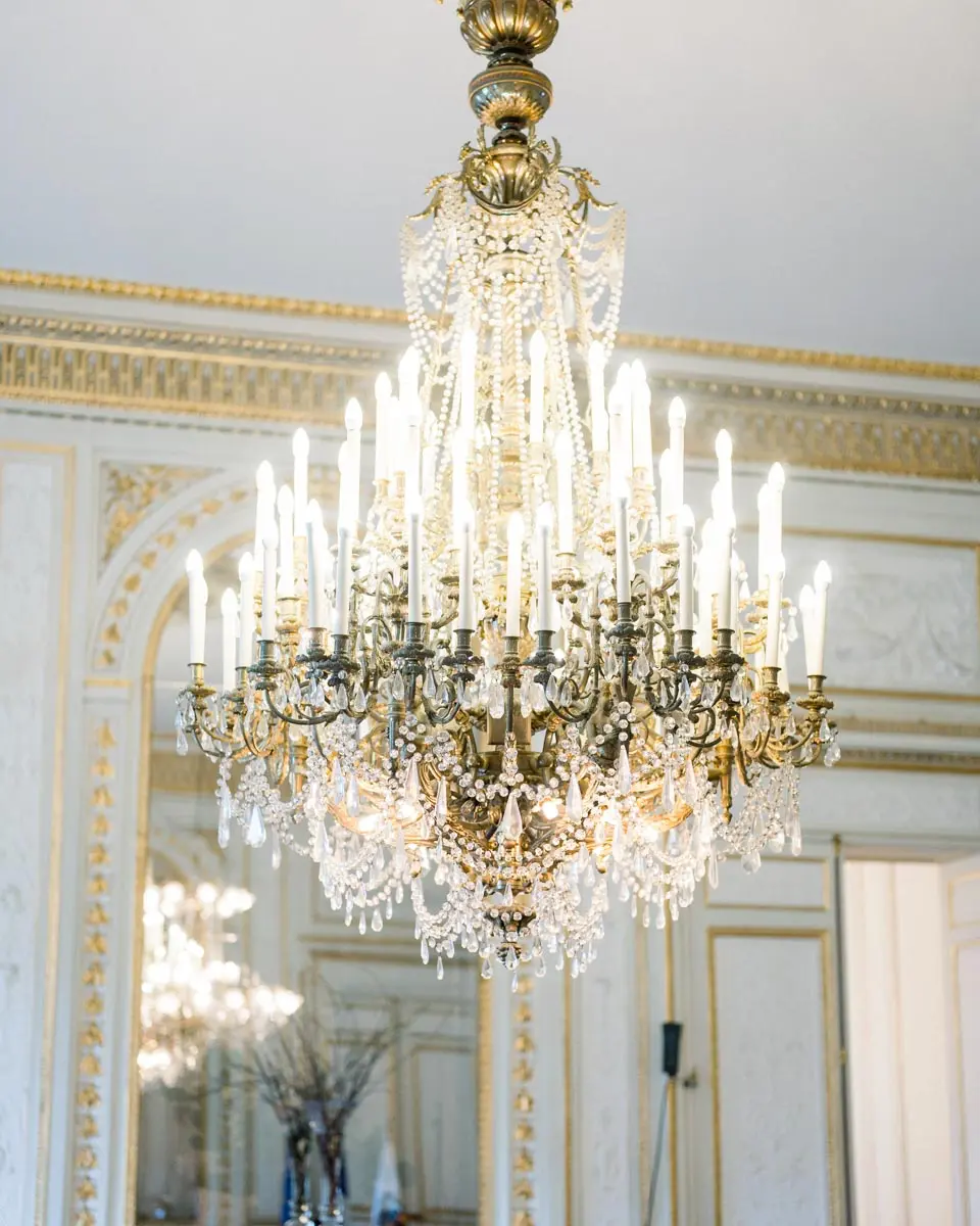Crystal chandelier and gilded décor in a reception room of Bordeaux town hall