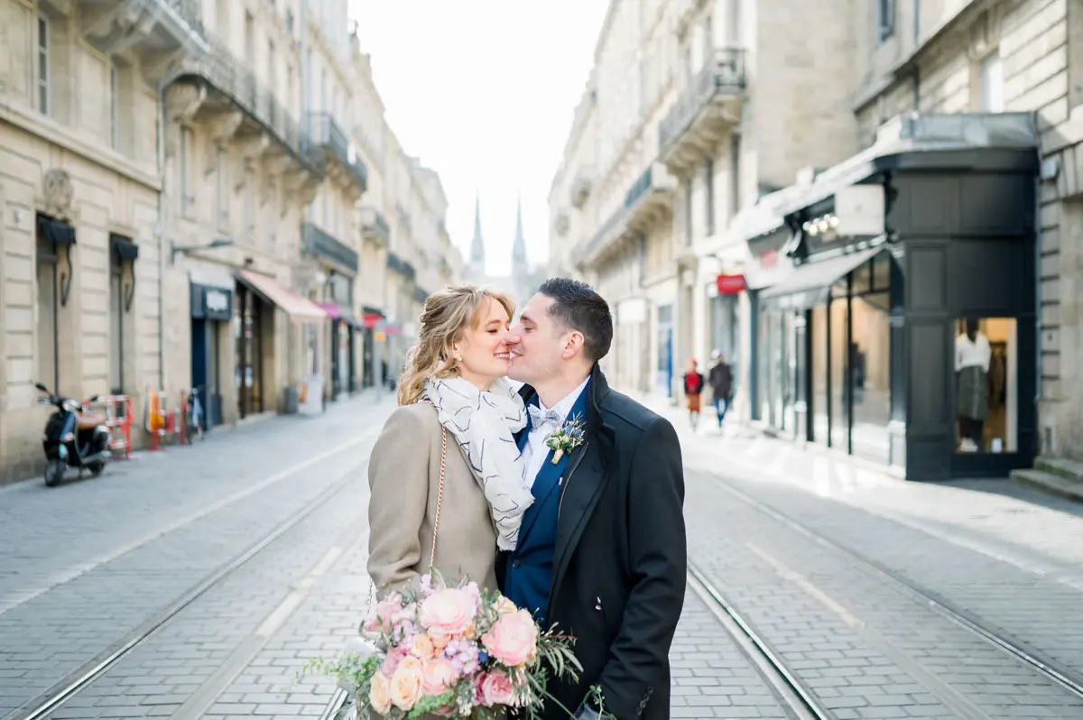 The couple kissing on the tram tracks in central Bordeaux