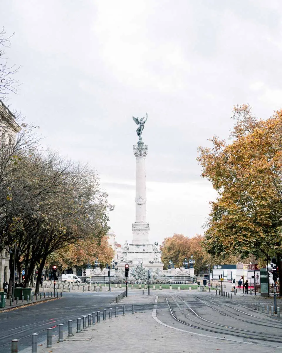 The Esplanade des Quinconces in autumn with the Girondins monument column, Bordeaux