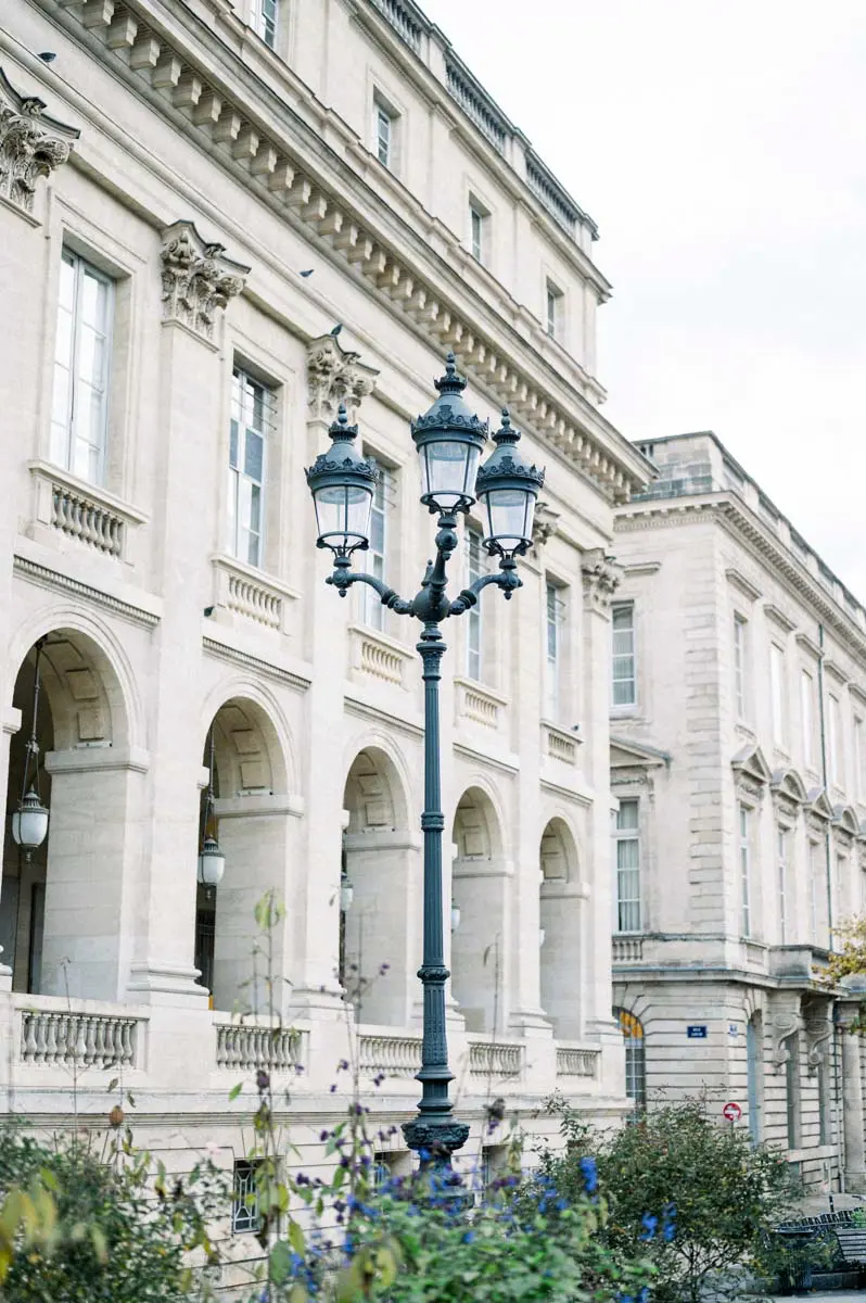 Classical facade and cast-iron street lamp in central Bordeaux