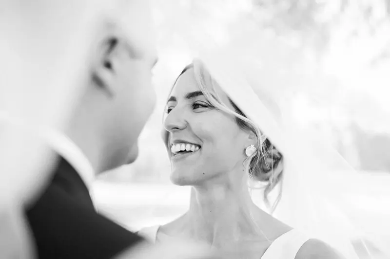 Smiling bride, black and white portrait, Château Pape Clément