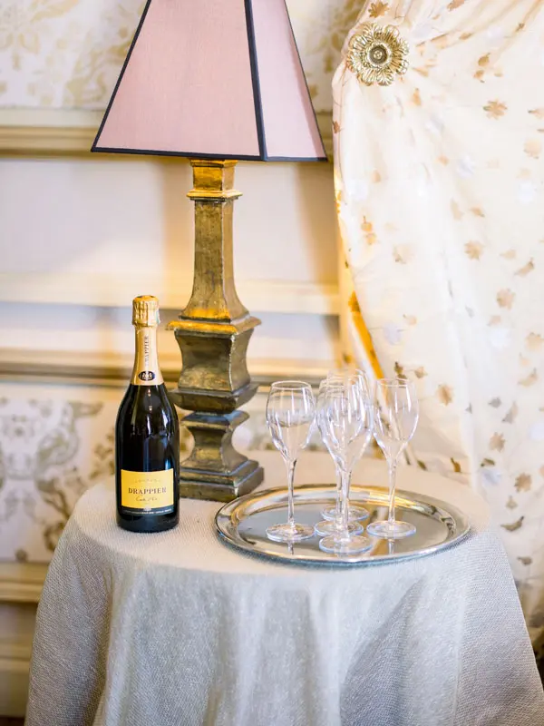 Champagne and glasses in a suite at Château Pape Clément