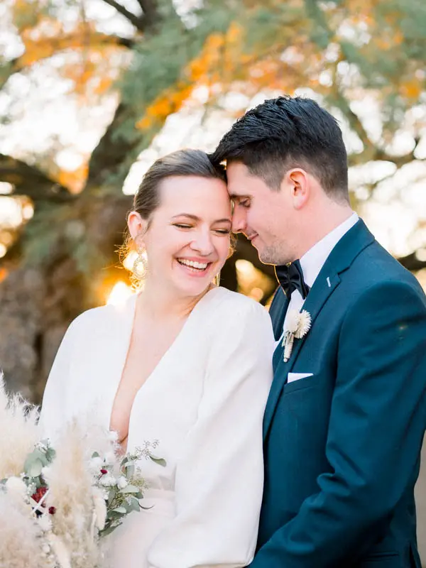 Smiling bride and groom at golden hour, Villa La Tosca