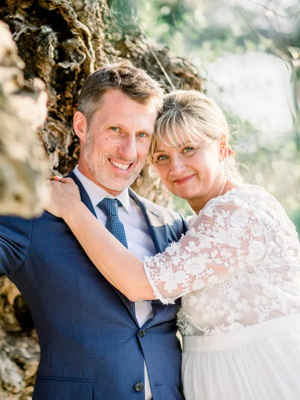 Hélène and Christophe smiling, wedding at Château Pape Clément