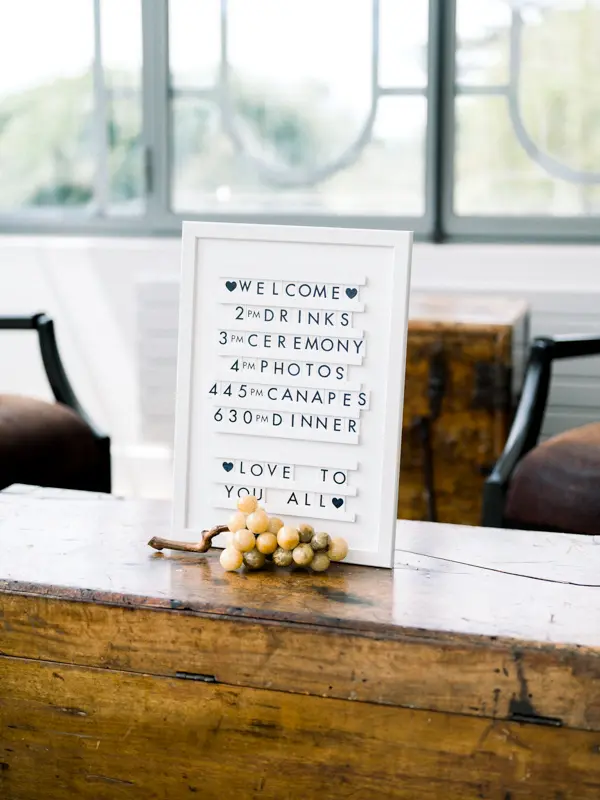 Wedding welcome sign with the day’s schedule, Château de Seguin