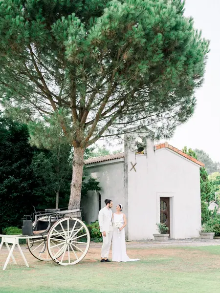 Bride and groom by the Saint-Christophe chapel at Domaine de Larchey