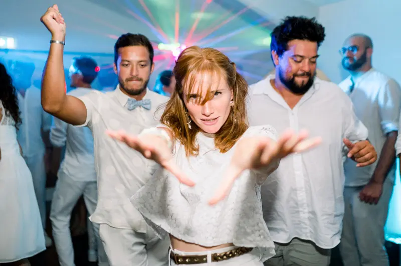 Guests dancing at a wedding party at Domaine de Larchey